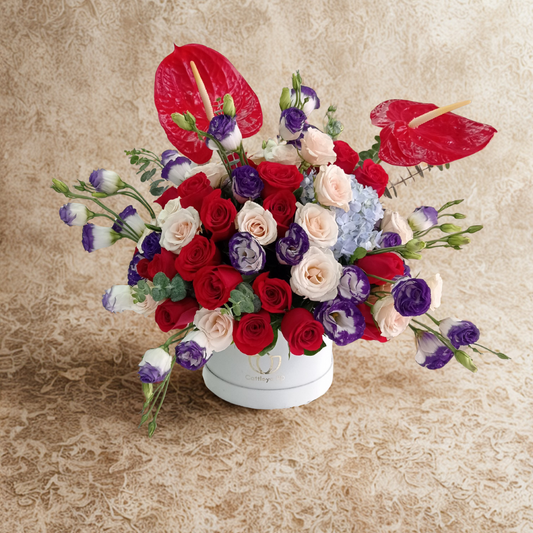 Caja con rosas, anthuriums y lisianthus